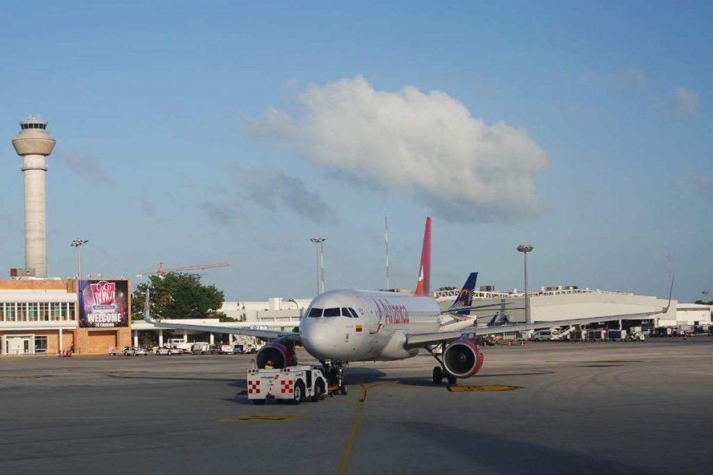how to get from Isla Mujeres to Cancun Airport1