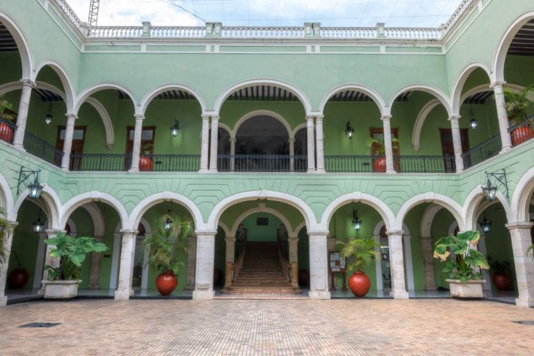 Hoe kom je van Holbox naar Merida, Mexico?